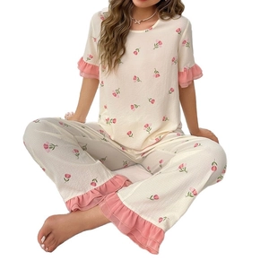 Women floral pajama set with tulip print, ruffle sleeve and pants trim in cream color
