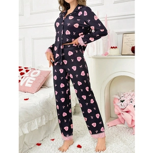 Women heart print pajama set with pink lace trim and long sleeve button-down design