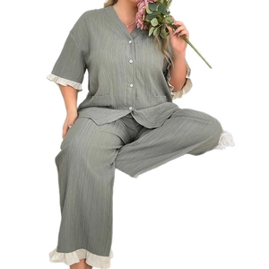 Women's plus size button-up pajama set in grey-green with ruffled trim and textured fabric