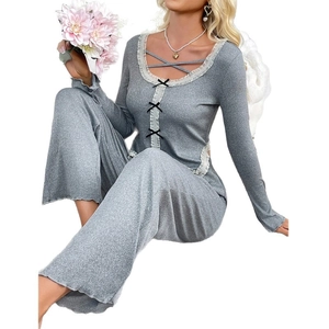 Women's grey ribbed knit lounge set with lace trim and bow details in two pieces