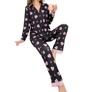 Women's black heart print pajama set with pink lace trim and long sleeves home wear