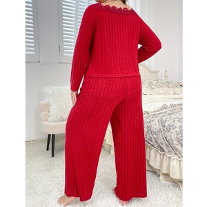 Women's red ribbed loungewear set with lace back collar detail and wide-leg trousers