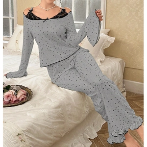 Detailed cold-shoulder gray polka dot pajama set with black lace trim and ruffled cuffs