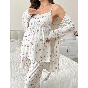 Close-up of floral maternity pajamas featuring lace trim and rib-knit texture