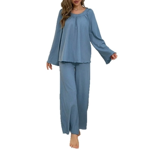 Women's dark blue waffle knit lounge set featuring crew neck long sleeves and wide leg pants
