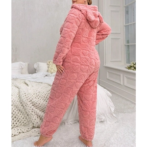 Pink oversized fleece onesie for women with embossed heart pattern and warm hood