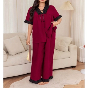 Women's burgundy V-neck pajama set with short-sleeved top and ruffled wide-leg pants