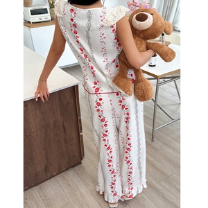 Floral pajama set for women featuring red roses and ruffle sleeveless top with long pants