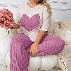 Plus size pajama set with beige heart print top and purple wide-leg ribbed pants