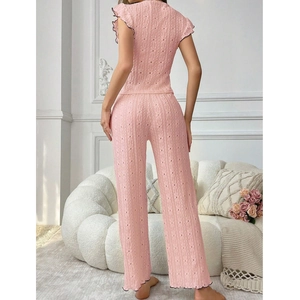 Pink knit two-piece pajama set with hollow design and ruffled sleeves for women