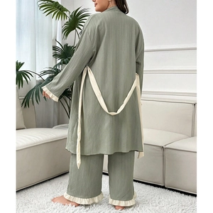 Three-piece lounge set in sage green with ruffled hem cardigan and wide-leg trousers