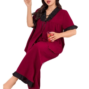 Women's 2-piece burgundy pajama set with V-neck button top and ruffled pants