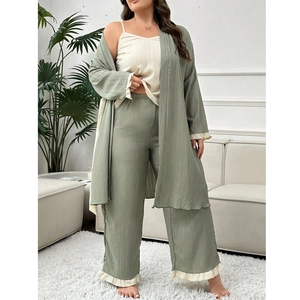 Three-piece lounge set with sage green robe, tank top and pants featuring ruffle hem