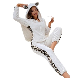 Women's cozy white fleece hooded jumpsuit with leopard print accents and front zipper