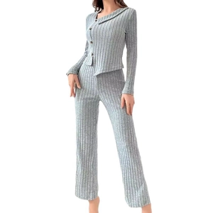 Pale blue-gray ribbed knit two-piece loungewear set with asymmetric button-up top and pants