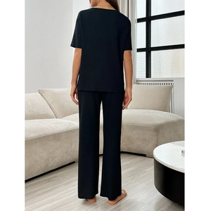 Ensemble détente 2 pièces noir pour femme avec haut à manches courtes et pantalon large plissé