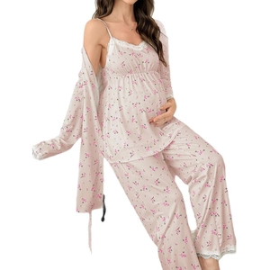 Three-piece maternity pajamas set with floral print and lace trim in soft pink