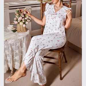 Women's floral pajama set with V-neck sleeveless top and ruffled trousers for summer