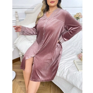 Pink velvet long-sleeve nightgown with V-neck lace trim and buttons in a home setting