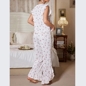 Floral pajama set for women featuring ruffled sleeves and wide-leg pants in sweet pink print