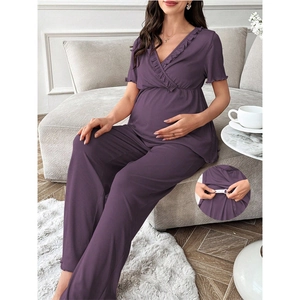 Detail of adjustable elastic waistband with button for purple lace maternity loungewear set
