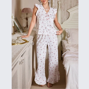 Floral print pajama set with V-neck sleeveless top and ruffled trousers in white and pink