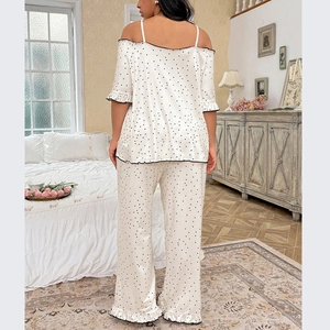Polka dot satin pajama set with lace camisole and wide-leg pants for a sweet loungewear look