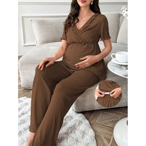 Detail of adjustable waist elastic on brown ribbed V-neck maternity lounge set