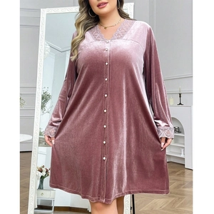 Detailed view of the lace neckline and plush velvet texture of the mauve housecoat dress