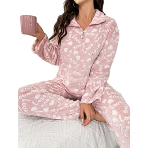 Pink heart print fleece pajama set with long sleeves and cozy plush flannel warmth