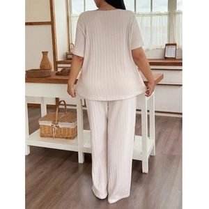 Loose knit lounge set for women with ribbed texture and two-piece design in soft pink