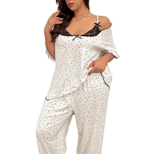 Women's two-piece polka dot pajama set with lace trim and bow in satin finish
