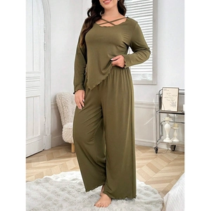 Olive green rib-knit lounge set with criss-cross neckline and ruffle trim details