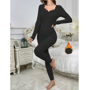 Women's black ribbed knit pajama set with V-neck lace trim and thermal long pants