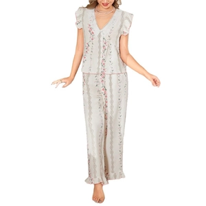 Women's V-neck floral pajama set with lace trim and ruffled hem in vintage style