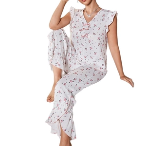 Women's floral pajama set with V-neck sleeveless top and ruffled trousers in pink print