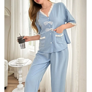 Sweet light blue pajama set with V-neck lace trim and bow knot detail for women