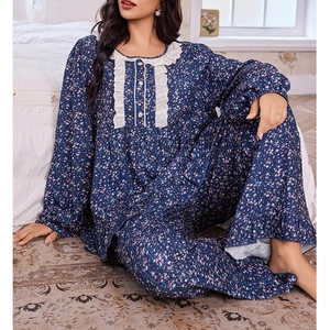 Navy floral pajama set with lace details and ruffled cuffs for a cozy home style