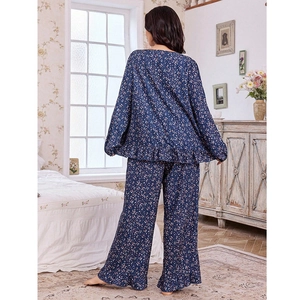 Women's loose dark blue floral pajama set with ruffled hem and long sleeves