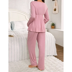 Pink ribbed maternity pajamas set with long sleeve top and pants showing back detail