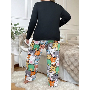 Women's black long sleeve pajama set with colorful cartoon animal print trousers