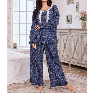 Women loose navy floral pajama set with white lace trim and ruffle details for home