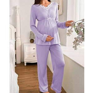 Detail of lavender maternity loungewear featuring lace V-neck and soft ribbed fabric