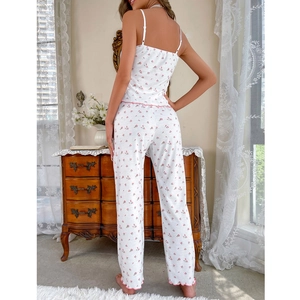 Women's two-piece floral pajama set with camisole and pants featuring pink lettuce trim