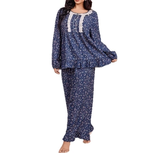 Navy blue floral pajama set with lace collar and ruffled edges for women
