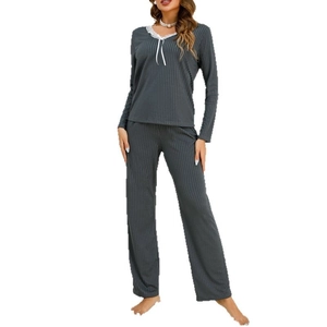 Women's dark grey pajama set with long sleeves, ribbed texture, and white lace V-neckline