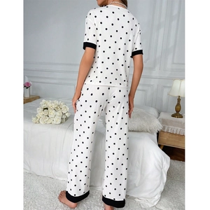 Sweet polka dot pajama set for women with short sleeve top and long pants in white and black