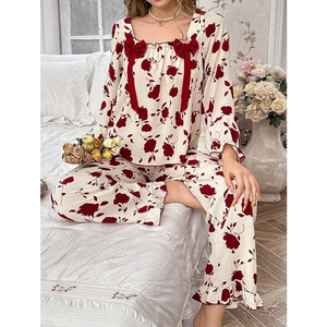 Women's floral pajama set with square neck, red bow detail and ruffle trim in beige