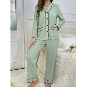 Women's 2-piece light green crepe pajama set with long sleeves and black contrast piping