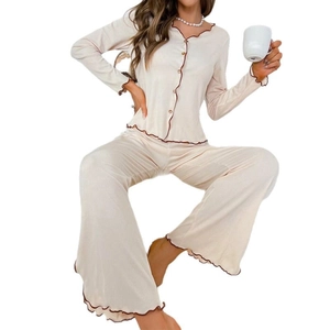 Women's V-neck long sleeve ribbed pajama set with contrast lettuce trim in apricot